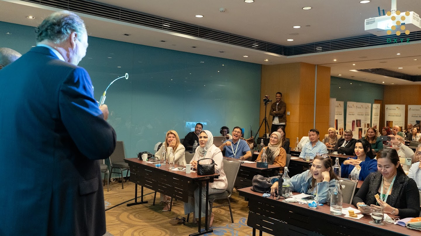 Audience viewing a keynote presentation
